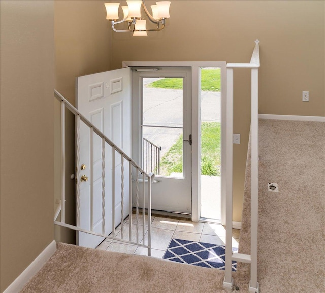10326 Balsam Ln, Eden Prairie, MN 55347 - tiled entrance foyer with a chandelier and carpet flooring