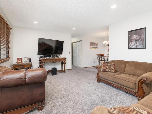 6540 84th Ct N, Brooklyn Park, MN 55445 - carpeted living area with recessed lighting, a chandelier, and baseboards