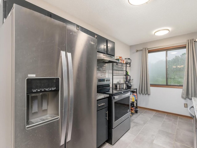 6540 84th Ct N, Brooklyn Park, MN 55445 - kitchen with appliances with stainless steel finishes, under cabinet range hood, a textured ceiling, and baseboards
