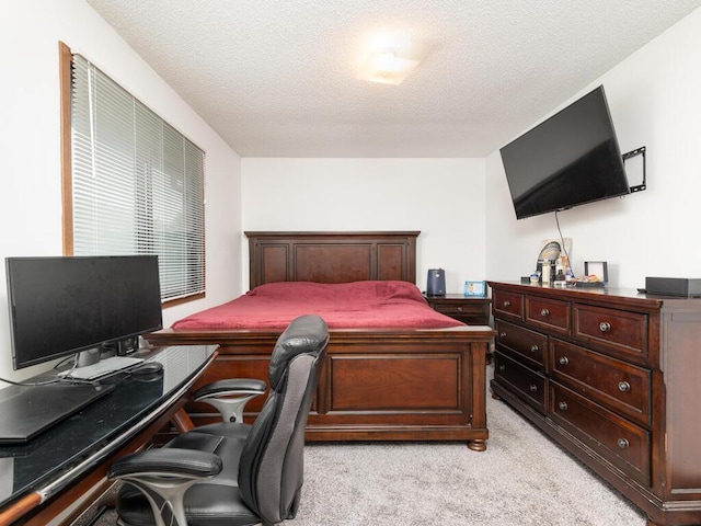 6540 84th Ct N, Brooklyn Park, MN 55445 - bedroom featuring light carpet, a textured ceiling, and an office area