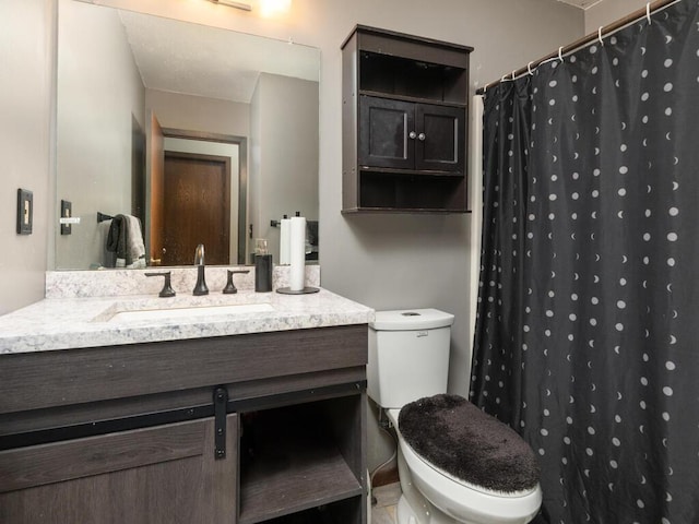 6540 84th Ct N, Brooklyn Park, MN 55445 - bathroom featuring vanity, toilet, and curtained shower