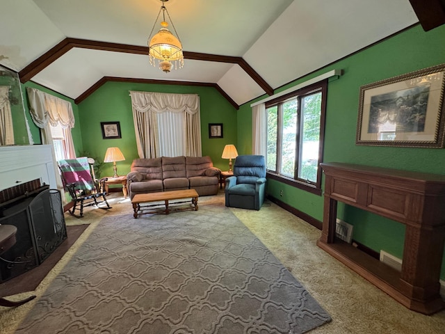 205 Lake Park Blvd, Fairmont, MN 56031 - living area featuring carpet flooring, lofted ceiling, baseboards, a chandelier, and a fireplace
