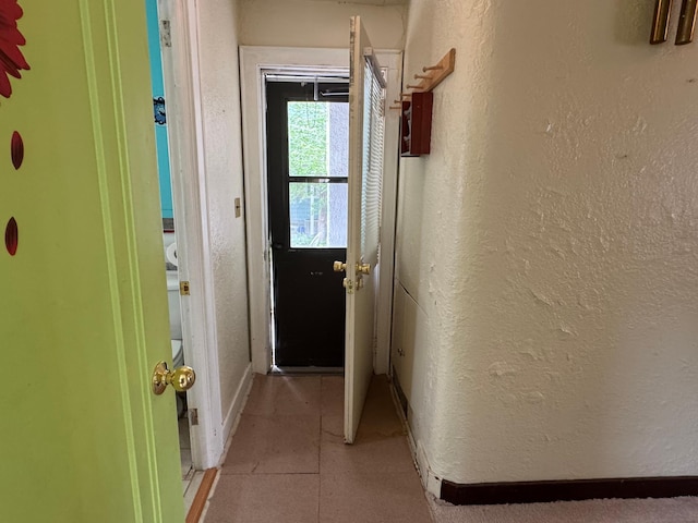 205 Lake Park Blvd, Fairmont, MN 56031 - hall with a textured wall and baseboards