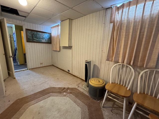 205 Lake Park Blvd, Fairmont, MN 56031 - finished basement with wallpapered walls, a drop ceiling, and baseboards