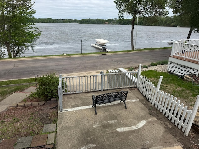 205 Lake Park Blvd, Fairmont, MN 56031 - view of patio / terrace with fence and a water view