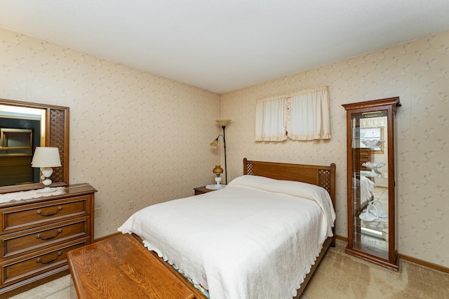 bedroom with light carpet