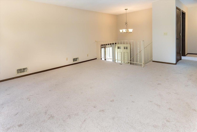10350 Balsam Ln, Eden Prairie, MN 55347 - carpeted spare room with a chandelier and baseboards
