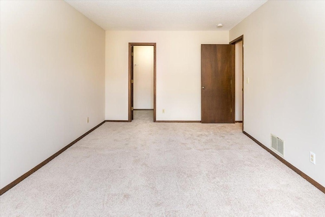 10350 Balsam Ln, Eden Prairie, MN 55347 - unfurnished bedroom featuring light carpet and baseboards