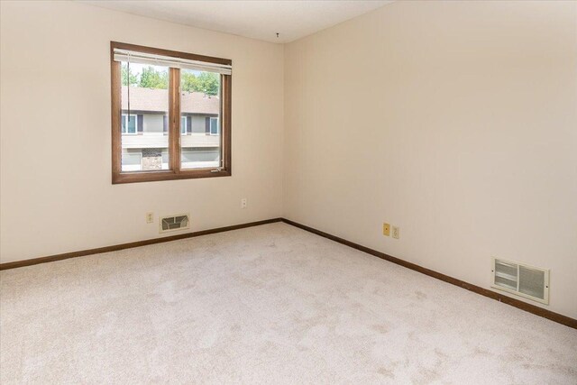 10350 Balsam Ln, Eden Prairie, MN 55347 - carpeted empty room with baseboards