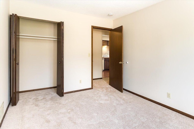 10350 Balsam Ln, Eden Prairie, MN 55347 - unfurnished bedroom with light carpet and a closet