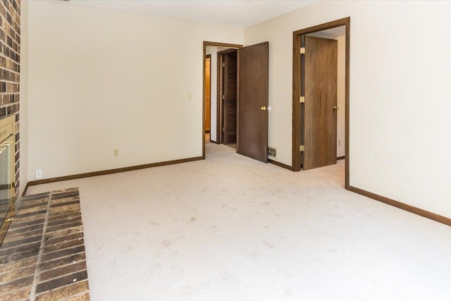 10350 Balsam Ln, Eden Prairie, MN 55347 - unfurnished living room with carpet flooring and a fireplace