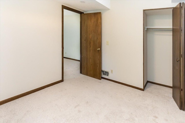 10350 Balsam Ln, Eden Prairie, MN 55347 - unfurnished bedroom featuring light carpet and a closet