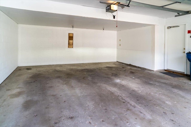 10350 Balsam Ln, Eden Prairie, MN 55347 - garage with a garage door opener and concrete block wall