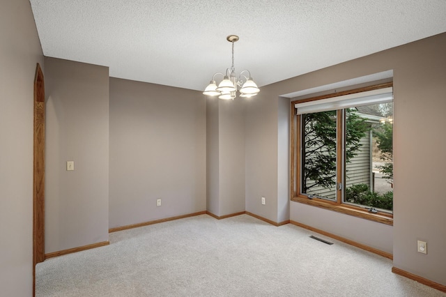 2970 Western Ave N, Roseville, MN 55113 - spare room with light carpet, a chandelier, baseboards, and a textured ceiling