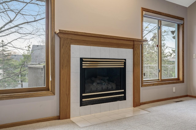 2970 Western Ave N, Roseville, MN 55113 - detailed view of a tile fireplace, baseboards, and carpet floors