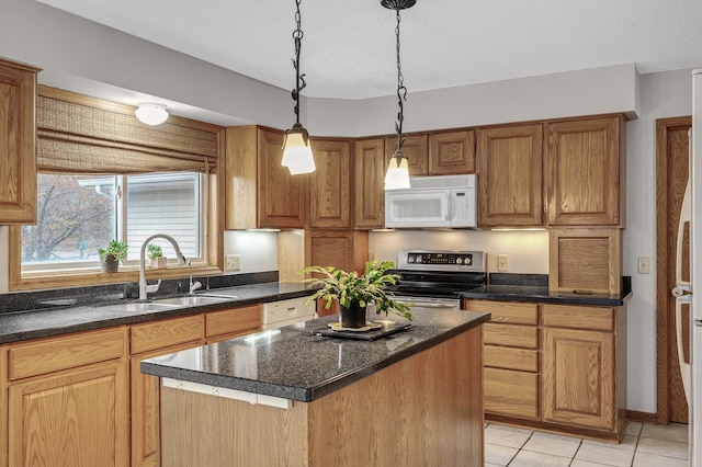 2970 Western Ave N, Roseville, MN 55113 - kitchen featuring white appliances, a sink, a center island, pendant lighting, and light tile patterned flooring
