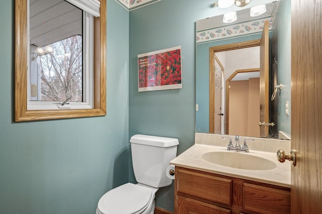 2970 Western Ave N, Roseville, MN 55113 - half bathroom featuring toilet and vanity