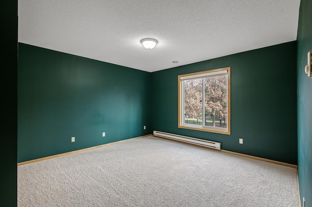 2970 Western Ave N, Roseville, MN 55113 - carpeted spare room featuring a baseboard radiator, baseboards, and a textured ceiling