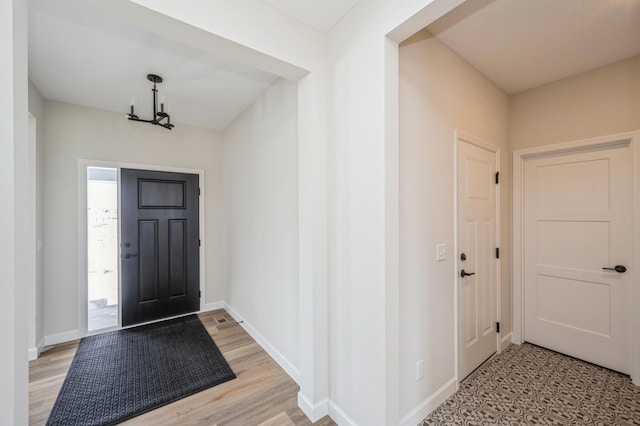 869 Greywood Blvd SW, Delano, MN 55328 - foyer entrance featuring baseboards and light wood-type flooring