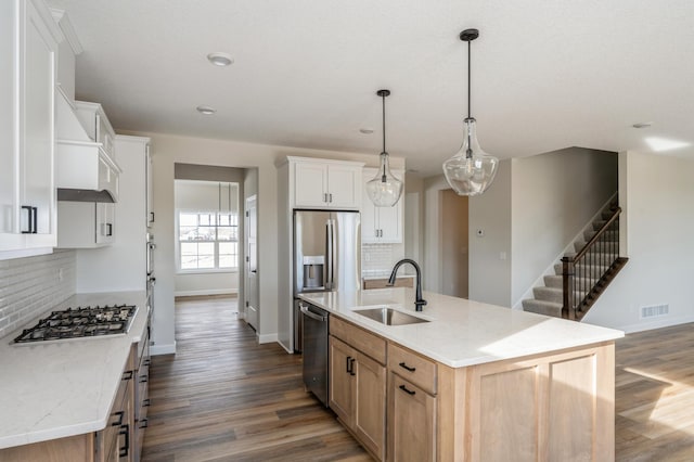 869 Greywood Blvd SW, Delano, MN 55328 - kitchen featuring a sink, appliances with stainless steel finishes, decorative backsplash, dark wood finished floors, and recessed lighting
