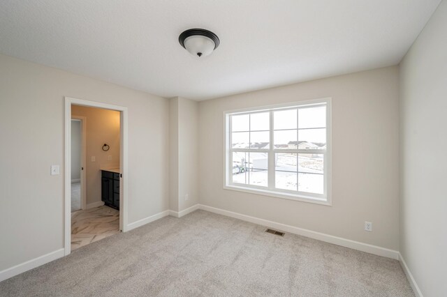 869 Greywood Blvd SW, Delano, MN 55328 - carpeted spare room with baseboards