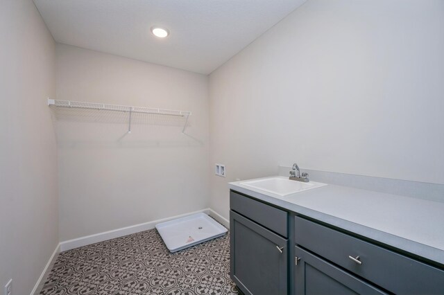869 Greywood Blvd SW, Delano, MN 55328 - washroom with washer hookup, cabinet space, and baseboards