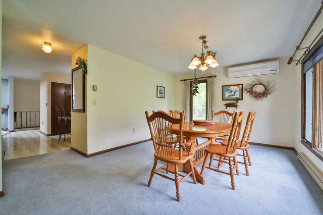 912 State 84 SW, Pine River, MN 56474 - dining area featuring a wall unit AC, light colored carpet, baseboards, a chandelier, and a baseboard radiator