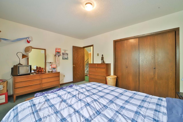 912 State 84 SW, Pine River, MN 56474 - bedroom featuring a closet, carpet floors, and a textured ceiling