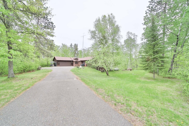 912 State 84 SW, Pine River, MN 56474 - ranch-style house with a front yard, asphalt driveway, and an attached garage