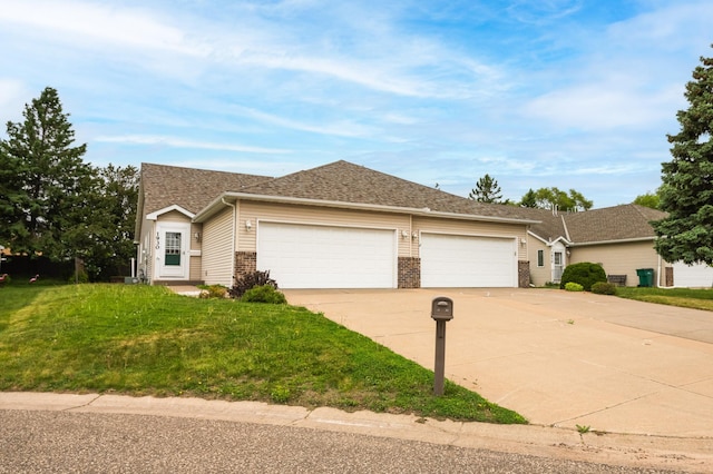 1930 Westridge Cir, Stillwater, MN 55082 - view of front of property featuring an attached garage, concrete driveway, and a front lawn