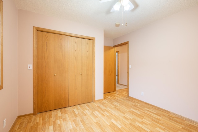 1930 Westridge Cir, Stillwater, MN 55082 - unfurnished bedroom featuring wood finished floors, a closet, a ceiling fan, and baseboards