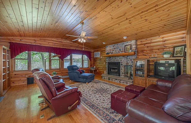 224 Norman Point Rd NW, Longville, MN 56655 - living room featuring rustic walls, wood ceiling, lofted ceiling, plenty of natural light, and hardwood / wood-style flooring