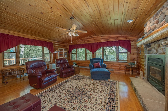 224 Norman Point Rd NW, Longville, MN 56655 - living area with log walls, wood ceiling, hardwood / wood-style floors, vaulted ceiling, and a ceiling fan