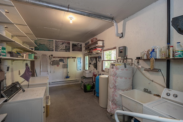 224 Norman Point Rd NW, Longville, MN 56655 - basement with water heater, a baseboard radiator, a sink, and separate washer and dryer