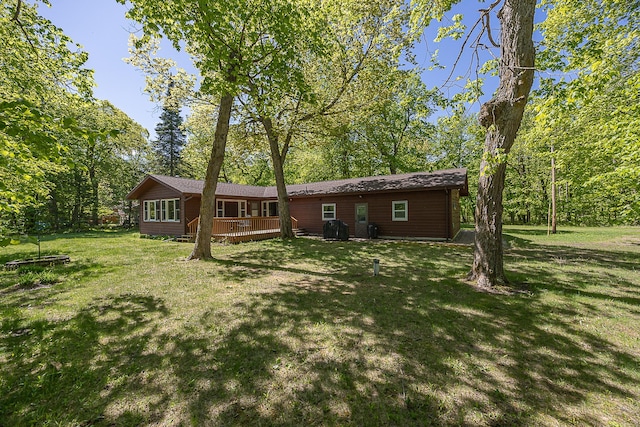 224 Norman Point Rd NW, Longville, MN 56655 - back of property with a deck and a yard