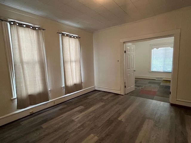 1030 28th Ave NE, Minneapolis, MN 55418 - unfurnished room with wood finished floors