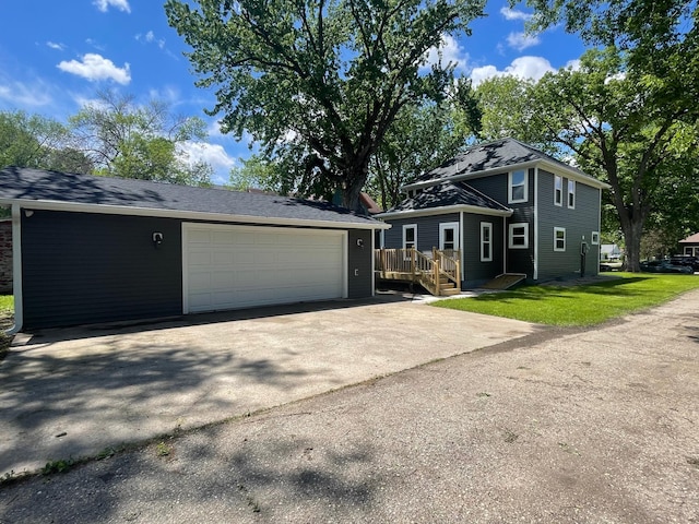 309 4th St, Marshall, MN 56258 - view of front of home with a garage and concrete driveway