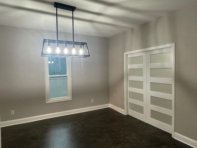 309 4th St, Marshall, MN 56258 - spare room featuring baseboards