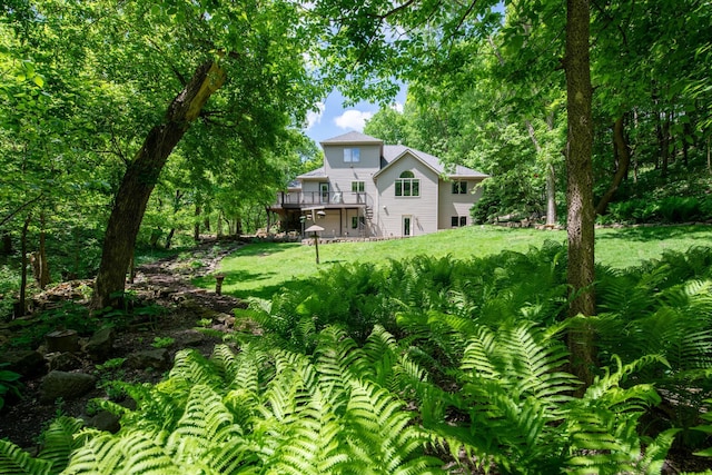 100 Hill Dr, Lime Twp, MN 56001 - view of grassy yard featuring a wooden deck