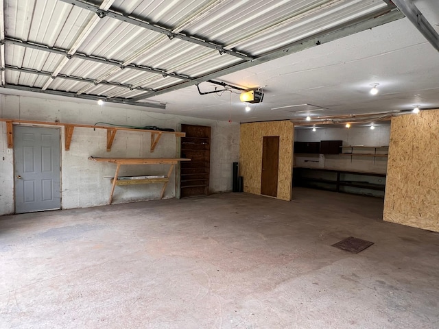 11216 State Highway 27, Beaver Twp, MN 55783 - garage featuring a garage door opener