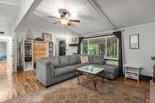 750 Prairie Ave SE, Cokato, MN 55321 - living area featuring wood finished floors, lofted ceiling, ceiling fan, and ornamental molding