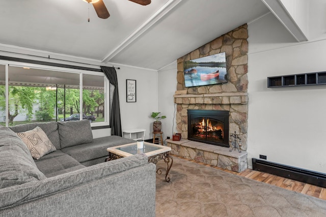 750 Prairie Ave SE, Cokato, MN 55321 - living room with vaulted ceiling, wood finished floors, a fireplace, and a ceiling fan