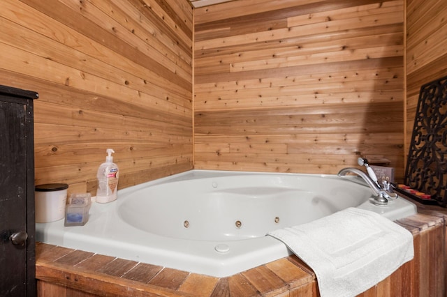 750 Prairie Ave SE, Cokato, MN 55321 - bathroom with a jetted tub and wooden walls