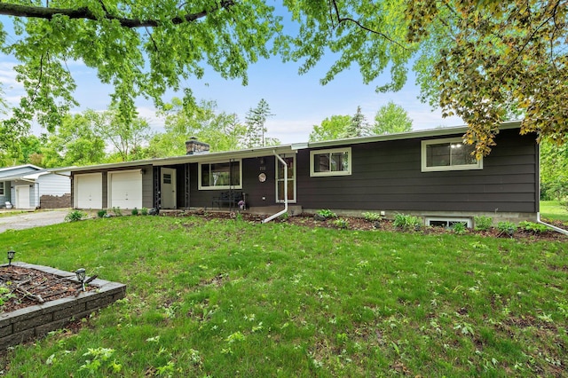 750 Prairie Ave SE, Cokato, MN 55321 - ranch-style home with an attached garage, concrete driveway, a front yard, and a chimney