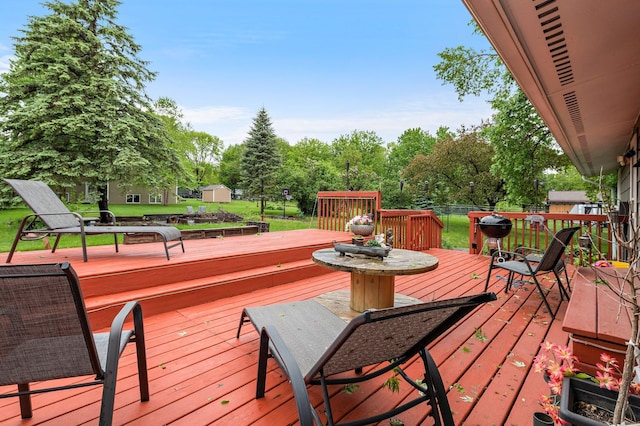 750 Prairie Ave SE, Cokato, MN 55321 - wooden deck featuring view of wooded area