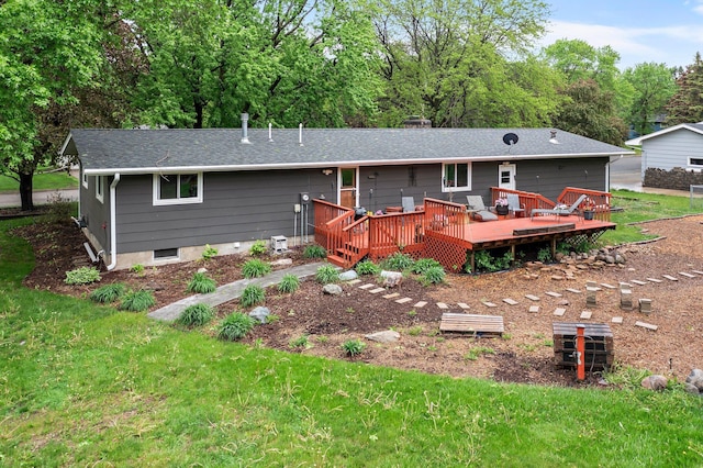 750 Prairie Ave SE, Cokato, MN 55321 - back of house featuring a wooden deck, a yard, and a shingled roof
