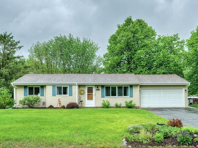 7349 Drew Ave N, Brooklyn Park, MN 55443 - ranch-style home featuring a garage, asphalt driveway, a front lawn, and a shingled roof