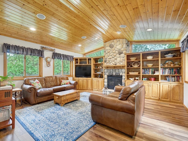 7349 Drew Ave N, Brooklyn Park, MN 55443 - living area with wood ceiling, vaulted ceiling, a stone fireplace, light wood-style floors, and recessed lighting