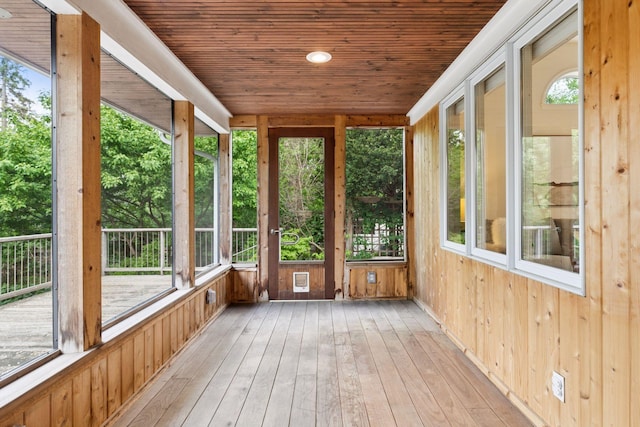 1215 Eleanor Ave, Saint Paul, MN 55116 - unfurnished sunroom with wooden ceiling, hardwood / wood-style floors, and wood walls