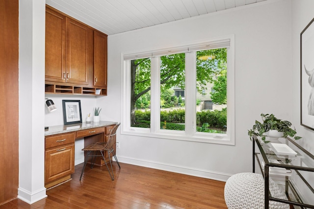 1215 Eleanor Ave, Saint Paul, MN 55116 - office featuring built in desk, dark wood-style flooring, baseboards, and ornamental molding